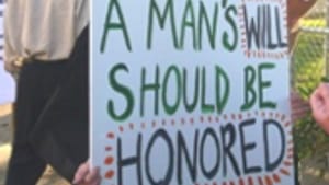 Protesters at the ceremony: Be careful what you wish for.