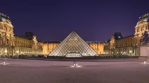 The Louvre pyramid at night (photo by Benh LIEU SONG, via Wikimedia Commons)