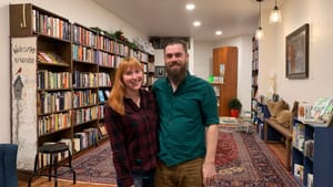 Partners in life and in the book business: Christina Rosso-Schneider and Alex Schneider open their Passyunk store. (Photo by Catherine Smith.)