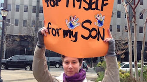 At Philadelphia's Women's March, Sarah, a young mom, knows that to stand up for women is to stand up for everyone. (Photo by Alaina Mabaso)