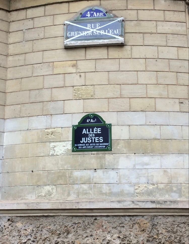 Language can divide or repair: a Marais street sign becomes “The Avenue of the Just,” for Jewish allies in World War II. (Photo by Anndee Hochman.)