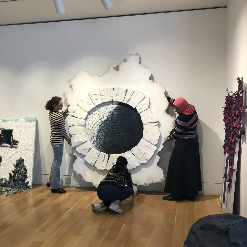 Does life after art school send you down the well? Students install work by MFA Amany Metawe. (Photo courtesy of PAFA.)
