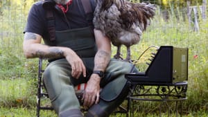 Michael Harren and one of his muses on the farm. (Photo by Diana Bezanski.)