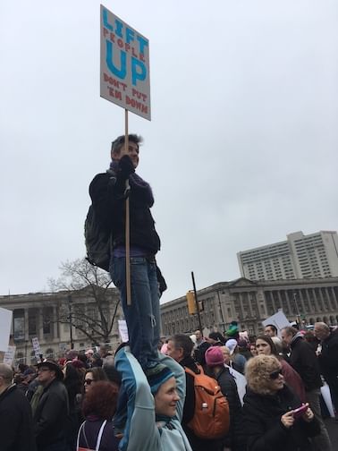 At Philadelphia's Women's March, Sarah, a young mom, knows that to stand up for women is to stand up for everyone. (Photo by Alaina Mabaso)