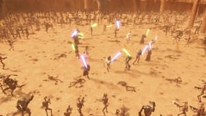 A screen cap of the film, a dozen or so with light sabers fight off an army of droids in a desert area.