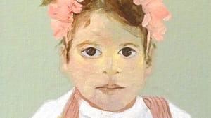 A portrait of a young girl, a floral set in her hair, white top and overalls, looking directly at the viewer