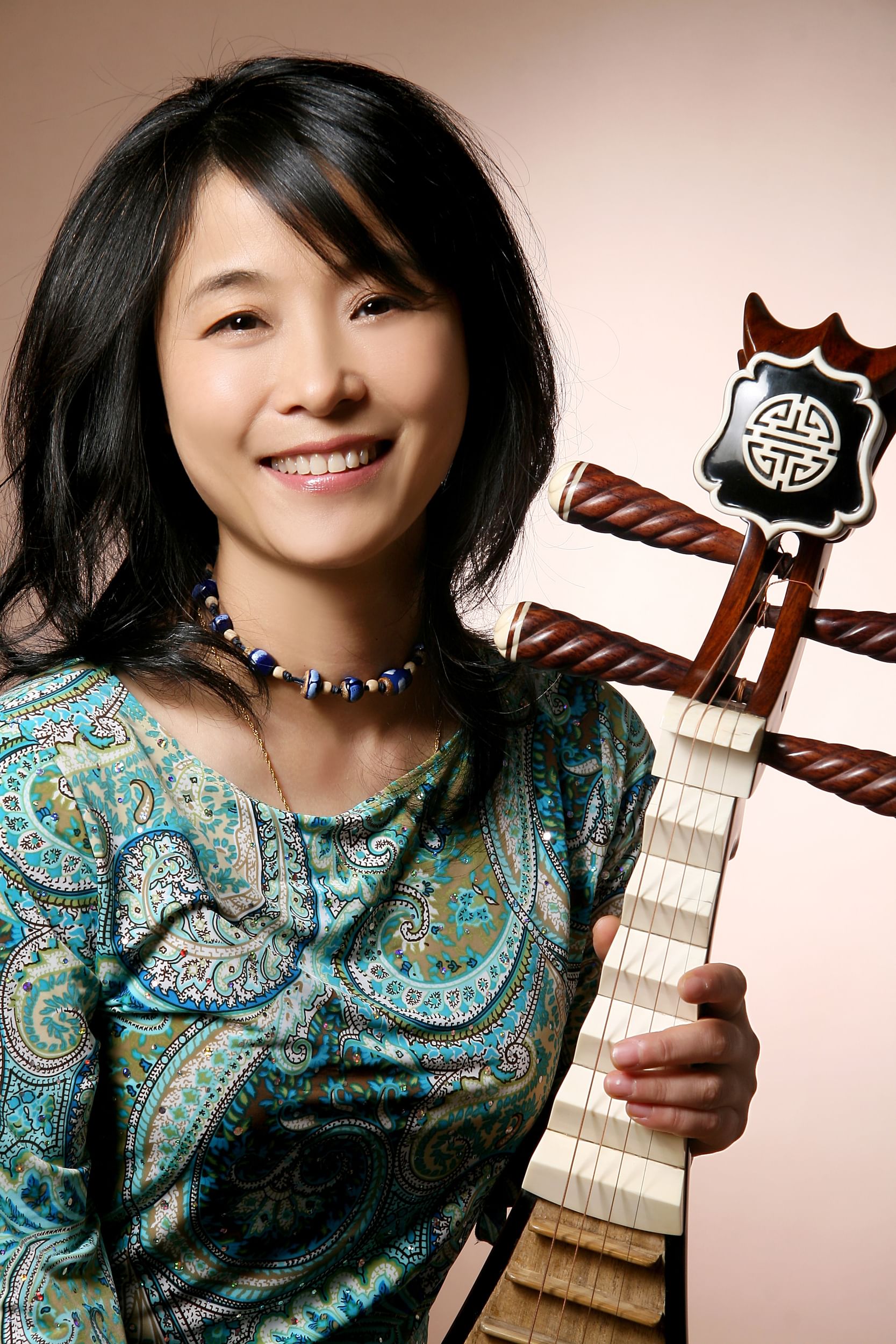 Wu Man is one of the world’s foremost pipa players. (Photo by Kuandi Studio.)