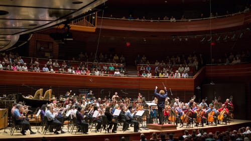 Here, Denève rehearses the orchestra for the Barnes/Stokowski festival. (Photo courtesy of the Philadelphia Orchestra.)