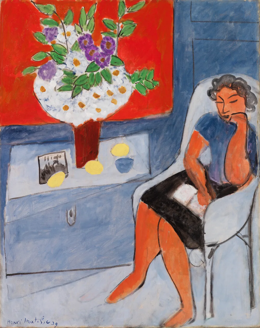 A stylized woman sits in a chair next to a large flower bouquet, a book in her lap and her cheek leaning on one hand.