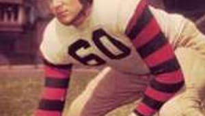 Same stadium, same striped sleeves, but I was no Chuck Bednarik.