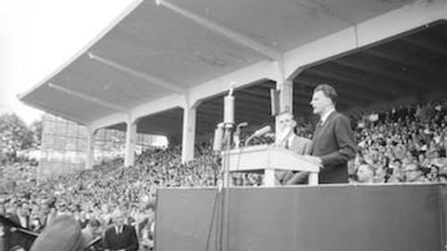 In 1954 Graham took his Crusade worldwide. Here, he preaches in Duisburg, Germany. (Photo via Creative Commons/Wikimedia.)