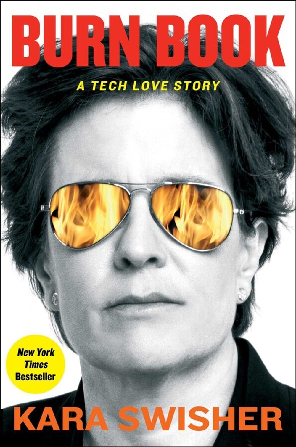 Book cover. Black & white close-up on Swisher’s impassive face, wearing aviator sunglasses that reflect orange flames.