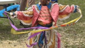 A young celebrant at the Carnival de Resistance. (Photo by Tim Nafgizer.)