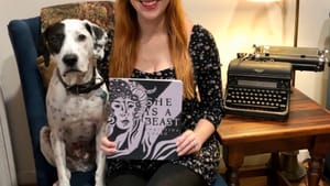 Author Christina Rosso-Schneider and her dog Atticus Finch celebrate her debut story collection, ‘She is a Beast,’ at A Novel Idea on Passyunk. (Photo courtesy of the author.)