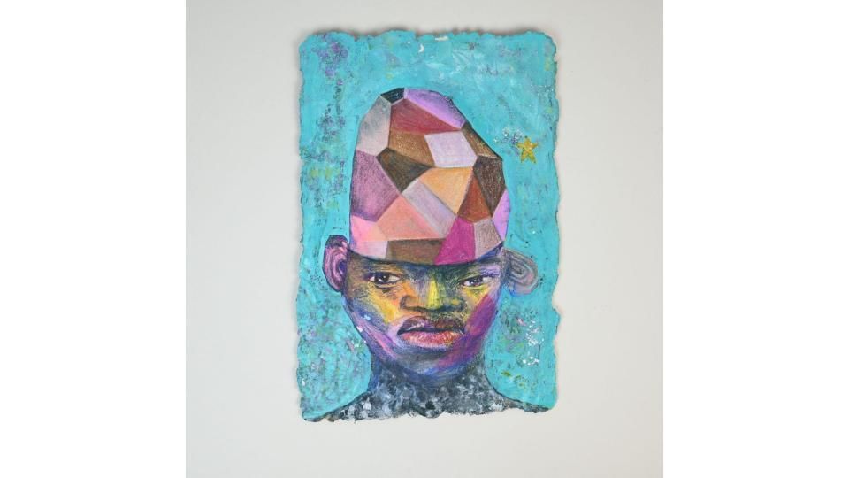 Impressionistic portrait of a Black man in yellow, brown, purple & turquoise, his head made of interlocking geometric shapes