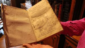 The first edition of 'Don Quixote,' Madrid, 1605, held by Elizabeth Fuller, librarian, Rosenbach Museum. (Photo by Anne S. Hunter)