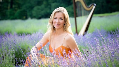 Harp soloist Elizabeth Hainen's focused performance underscored the concerto's significance. (Photo by Amanda Stevenson Photography.)