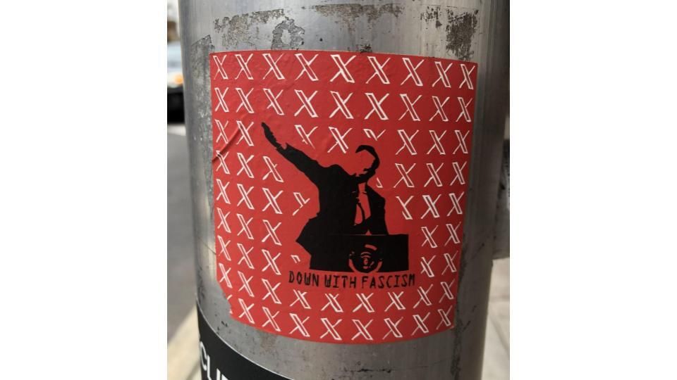 Elon down with fascism slide