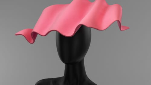 Givenchy's 'Wave Hat' looks ready to be dipped in a bowl of salsa. (Photo courtesy of the Philadelphia Museum of Art.)