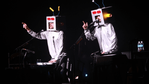 Bret and Jemaine onstage somewhere else at some other time. (Photo by Kris Krug via Creative Commons/Flickr)
