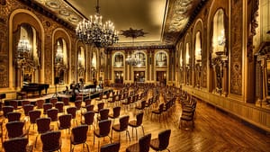 The Hotel du Pont’s Gold Ballroom lives up to its name and makes a beautiful setting for chamber music. (Photo by Brian Truono.)