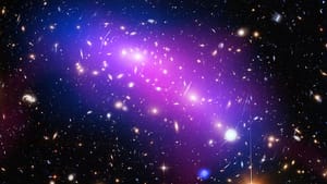 Two galaxy clusters collide 4.3 billion light-years from Earth. (Image via Wikimedia Commons.)
