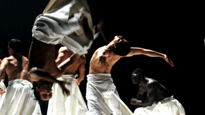 Hervé Koubi's street dancers, grounded and aloft. (Photo by Ahmad Daghlas.)