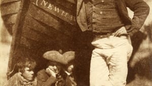 D.O. Hill and Robert Adamson’s 1845 New Haven salt print from a calotype negative: ‘Sandy Linton, his boat and his bairns.’ Collection of Michael Mattis and Judy Hochberg. (Image courtesy of the Barnes.)