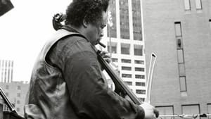 The great Charles Mingus plays his French bass with a bow on July 4, 1976, in New York City. (Photo via Tom Marcello, via Creative Commons/Flickr.)