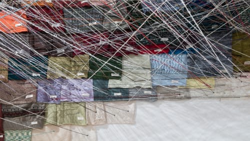 Shin's "Unraveling" literally connects the threads between Asian-American artists. (Photo by Joseph Hu.)