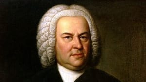 A portrait of Bach wearing a black robe over a white top, holding a sheet of music