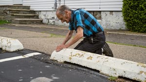 "Wyoming Avenue" (2014): What drives a man to his knees? (Photo by Justin Kimball.)