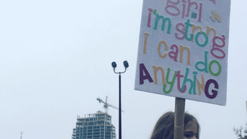 At Philadelphia's Women's March, Sarah, a young mom, knows that to stand up for women is to stand up for everyone. (Photo by Alaina Mabaso)