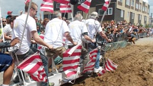 2014 Derby riders meet an enthusiastic crowd at the mud pit. (Photo courtesy of New Kensington CDC.)