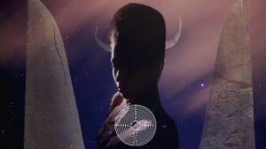 Show logo. A person with thin white horns, silhouetted against a starry sky, stands between two rock faces.