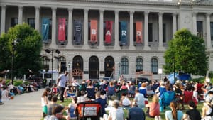 Last summer, a crowd attended a Shakespeare performance in the park outside the Free Library. Photo by Alaina Mabaso.