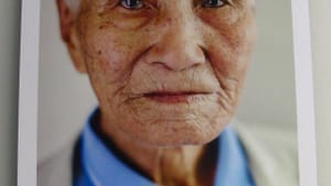 Nam Keung-bong, 87, lost his only chance to see his wife and son after a lifetime apart. (Photo by Pamela J. Forsythe; original artwork by Laura Elizabeth Pohl.)