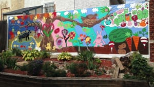 A newly completed mural and garden at MAAG. Photo by Alaina Mabaso.