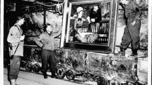American GIs admire "In the Conservatory" by Édouard Manet. This painting from the Kaiser-Friedrich Museum in Berlin had been brought to the mine for safekeeping. (Photo credit: National Archives and Records Administration, College Park, MD / Public Domain)