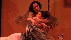 Rachel O'Hanlon-Rodriguez's Marisol, held by her guardian angel, played by Alexandra King. (Photo by Paola Nogueras)