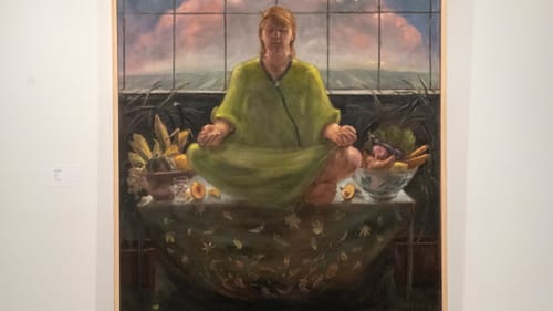 Why is she meditating with vegetables? Just go with it in Jeff Dion’s ‘Earth.’ (Photo by Dave Rizzio.)