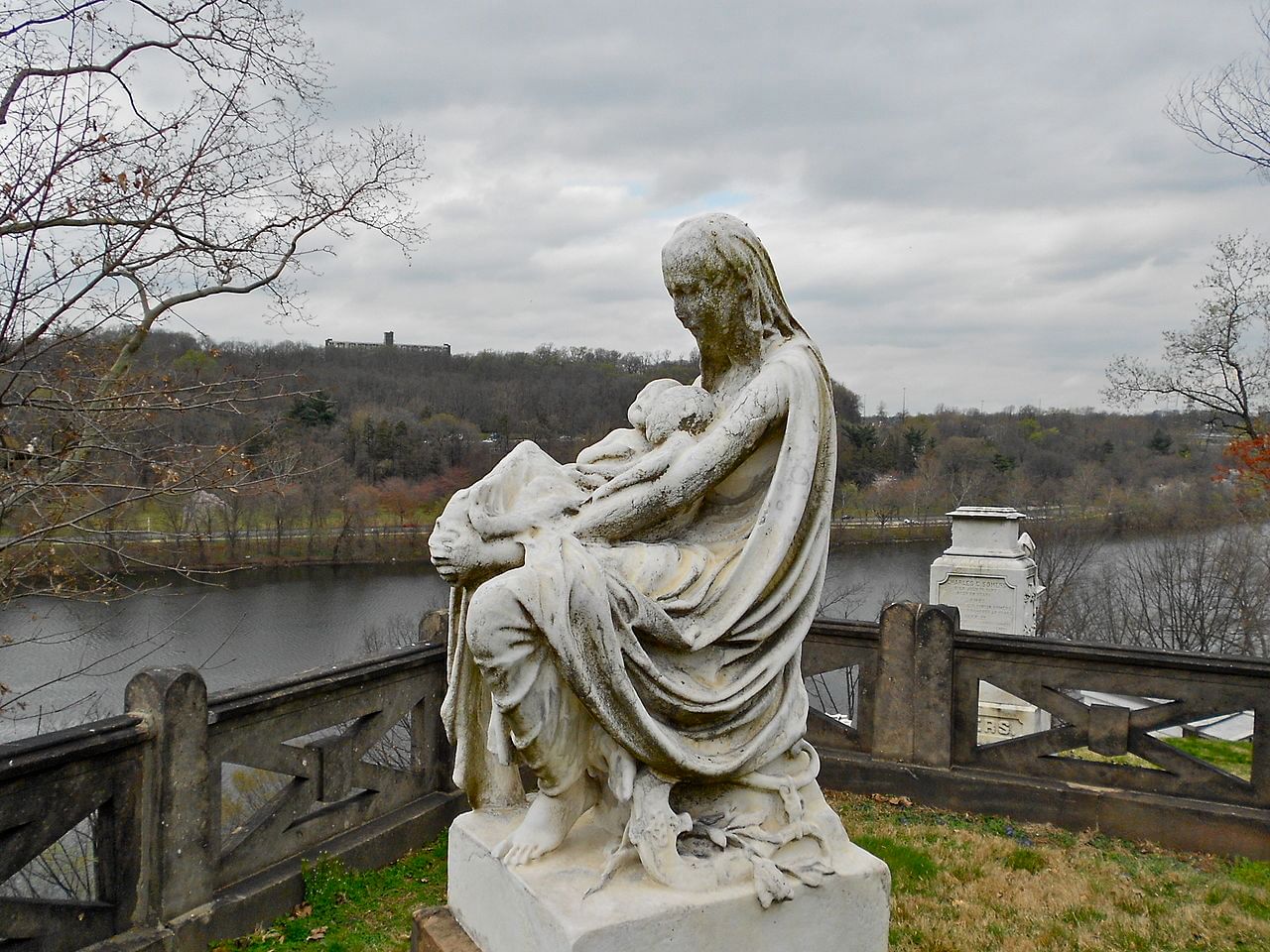 Mother and Twins Monument by Henry Dmochowski Saunders, commemorating his wife and children. The site overlooks the bend in the Schuylkill River where the twins drowned. (Photo by Smallbones via Creative Commons/Wikipedia)