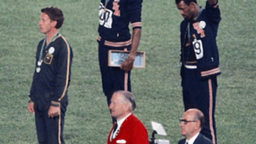 Before Colin Kaepernick took a knee, there was the 1968 Olympics's "Black Power Salute." (Photo via Creative Commons/Wikimedia)