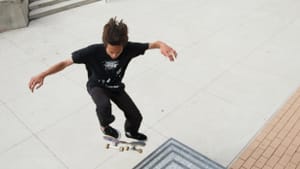 A skater tries out Monk's work. Photo by Steve Weinik for the City of Philadelphia Mural Arts Program.