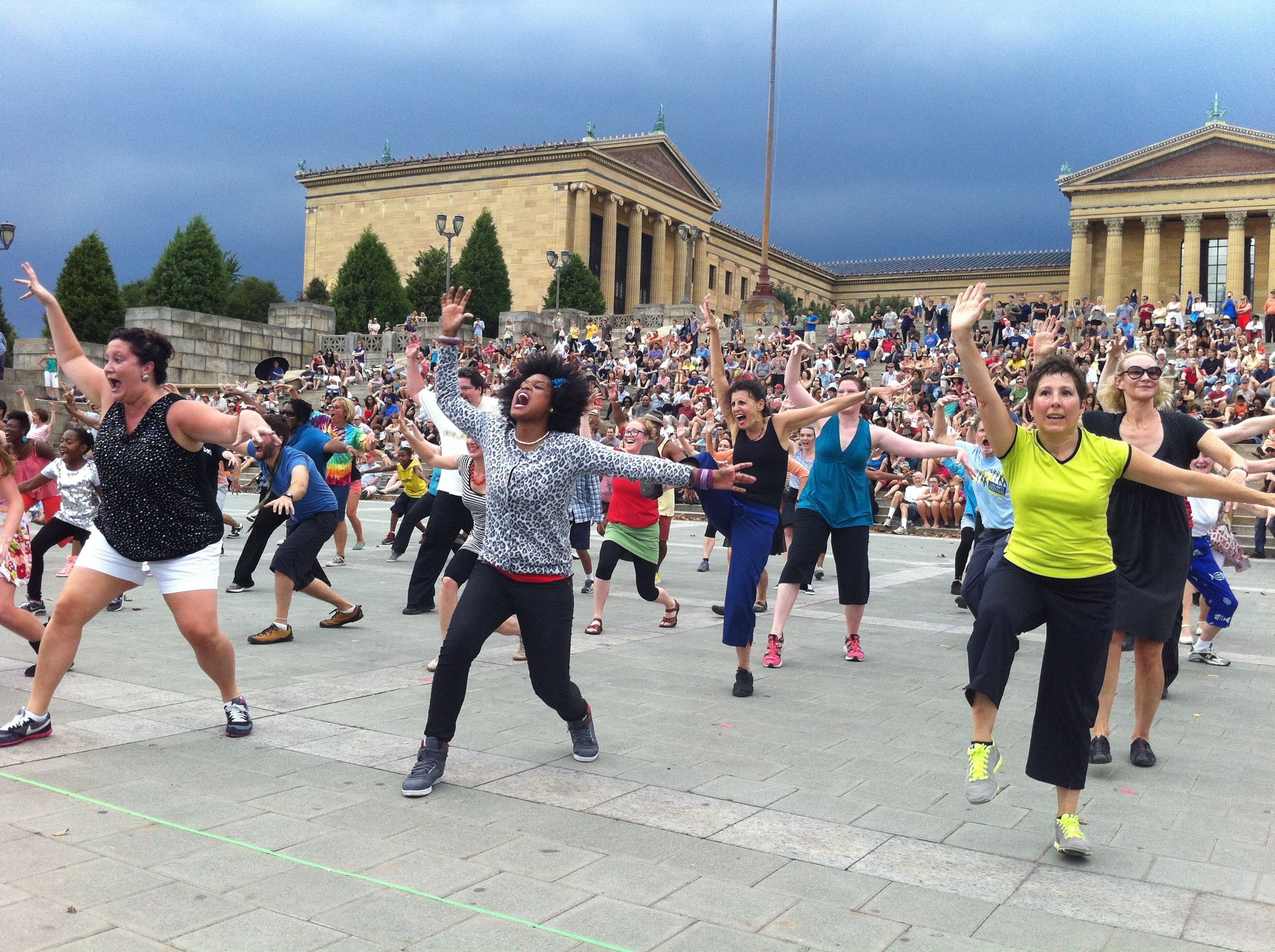 Philadelphians come as they are to a public dance extravaganza. (Photo by Maya Daoud.)