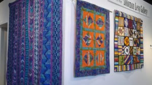 A few of the quilts on display at Mt. Airy Art Garage. Photo by Alaina Mabaso.