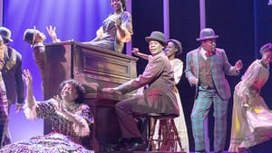 Nkrumah Gatling (center) plays aspiring Harlem musician Coalhouse Walker Jr. as a man who believed in America's promise. (Photo by Lee A. Butz.)