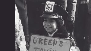 The cover: black & white photo of small boy in a police uniform holding a protest sign; title in yellow block at bottom right