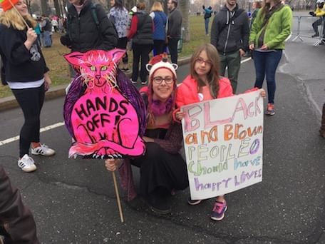 At Philadelphia's Women's March, Sarah, a young mom, knows that to stand up for women is to stand up for everyone. (Photo by Alaina Mabaso)