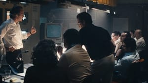 Scene from September 5: An early 1970s newsroom crowded with anxious male journalists.